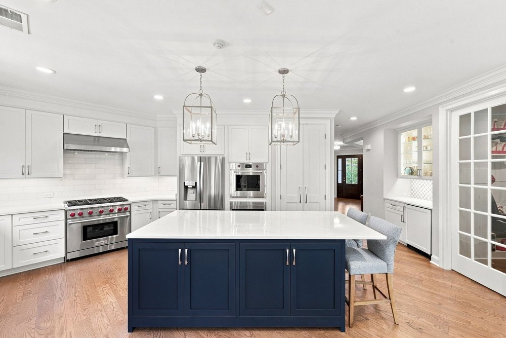 Premium stainless appliances and white cabinetry